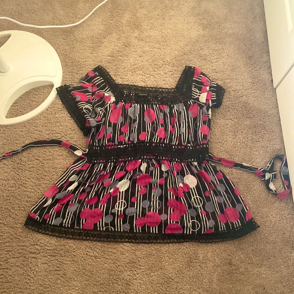 A size 18-20 real y2k dress/cover up. It’s sheer, with a tie at the waist